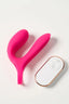 Pink Myvelvettouch Cock Ring and Remote Control Couple Vibrator and white electronic controller on a light pink background
