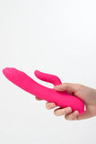 Hand holding a pink Myvelvettouch G-spot Tapping and Clitoral Stimulation Vibrator against a white background