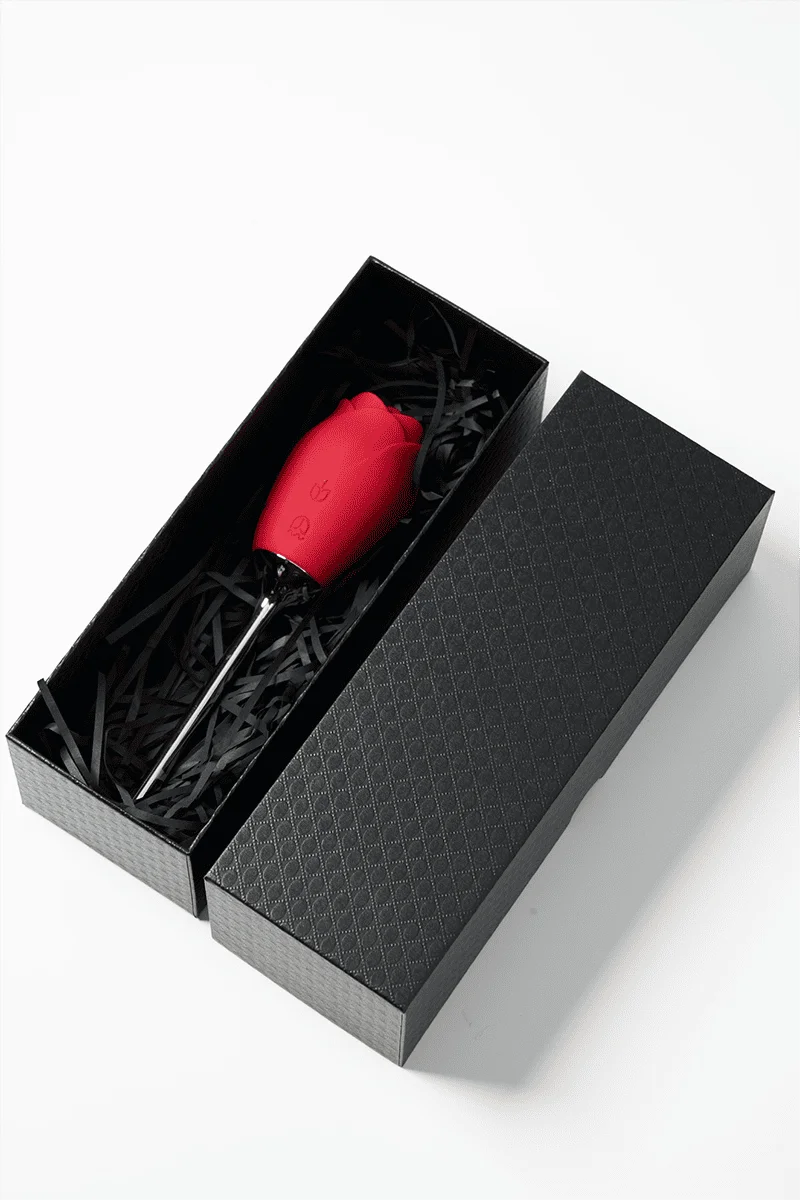 Myvelvettouch Rose Vibrator with Tongue Licking and Clitoral Stimulation with metal handle in a black box on a white background