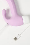 Purple Myvelvettouch Rabbit 3-in-1 Tapping and Sucking Vibrator with a USB cable on a white background