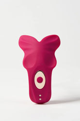 Pink and white Myvelvettouch Remote control sex toys Panty Vibrator device on a light gray background