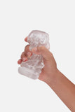 Hand holding a clear inside of Suction Cup Automatic Sucking Vibration Voice Aircraft Cup against a white background