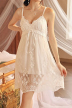 White Myvelvettouch lace nightgown worn by a model with a soft, blurred background
