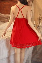 Red Myvelvettouch lace nightgown worn by a person in a bedroom setting