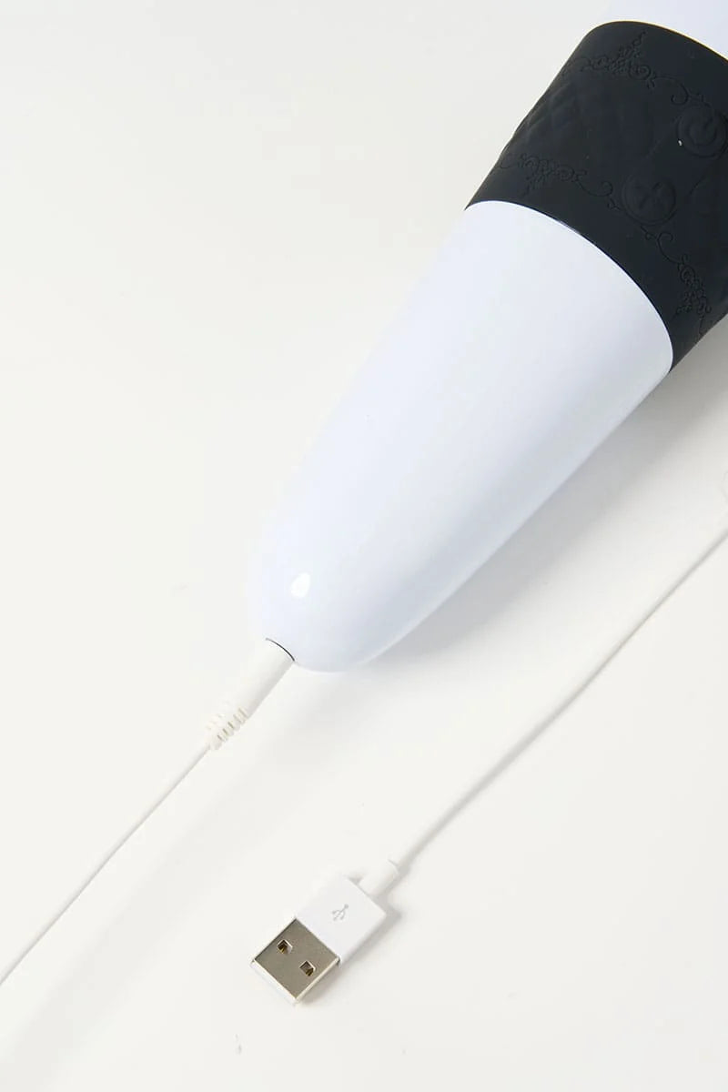 White and blackMyvelvettouch Classic Japanese Movie Super Large AV Stick with a USB cable on a white background