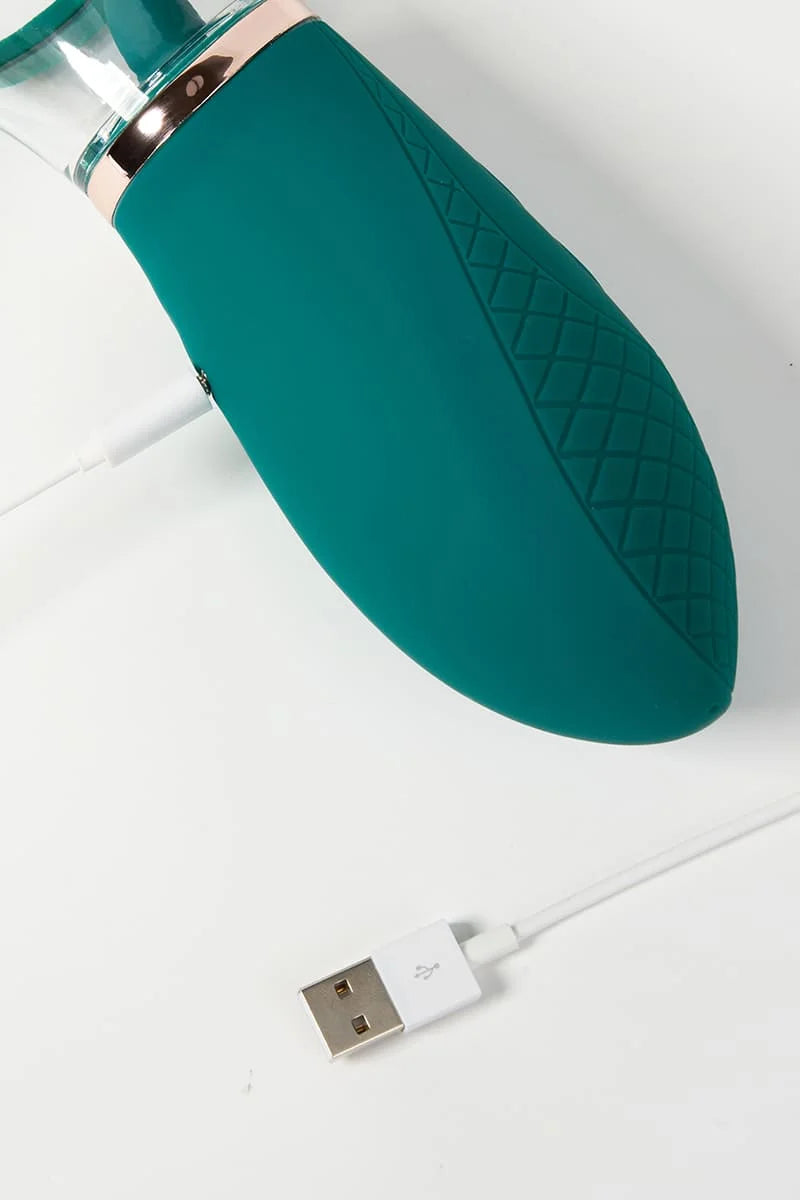 Grean silicone Myvelvettouch Clitoral Suction and Licking Vibrator with USB cable on a white background