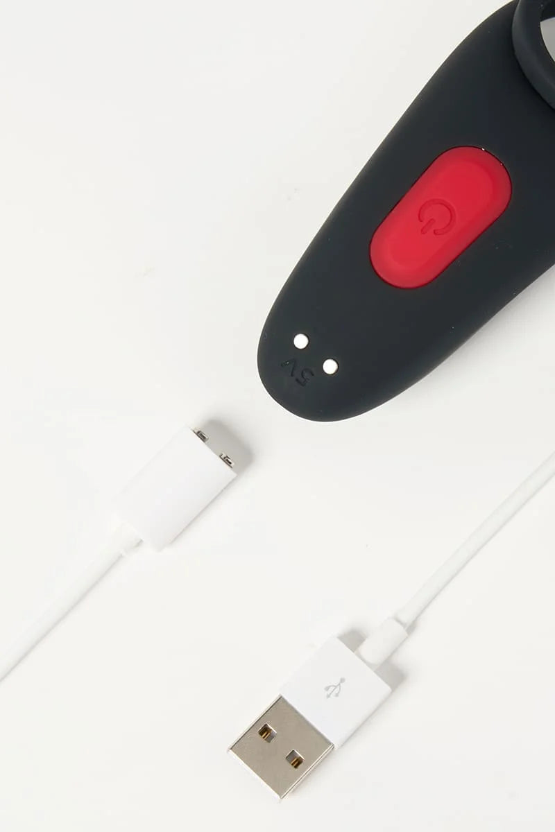 Black and red Myvelvettouch Couples Vibrating Ring with Remote Control with a USB cable on a white background
