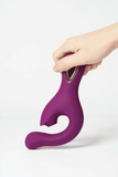Myvelvettouch Elegant Purple G-Spot and Clitoral Sucking Vibrator 2-in-1 with a handle held by a hand on a white background