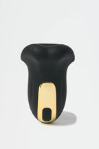 Black and gold Myvelvettouch Penis Trainer on a white background
