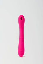 Pink silicone Myvelvettouch Portable Clitoral Suction and Vibrator 2-in-1 on a white background