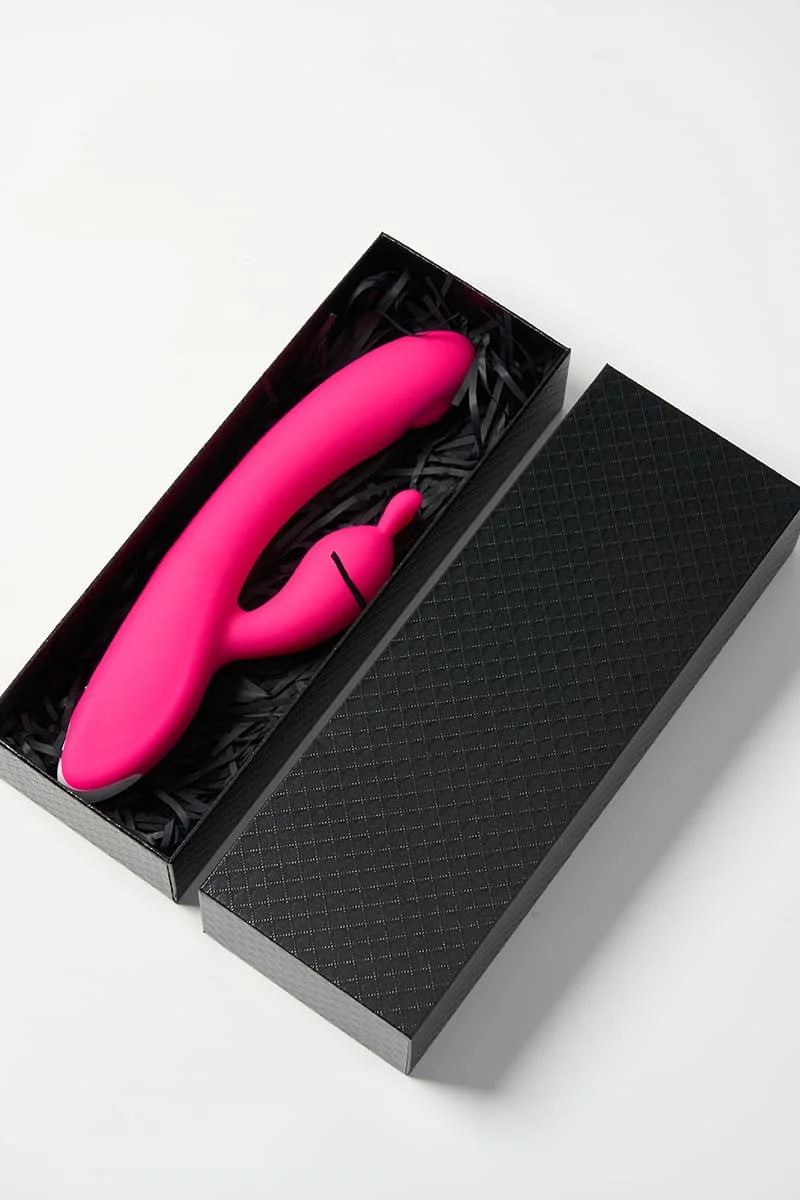 Pink Myvelvettouch Rabbit Clitoral Stimulation and G-spot Slapping Vibrator in a black box on a white background