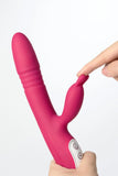 Pink Myvelvettouch Rabbit Clitoral Stimulator and Thrusting Vibrator with a hand holding it on a white background