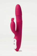 Pink silicone Myvelvettouch Rabbit Clitoral Stimulator and Thrusting Vibrator with a white button on a light gray background