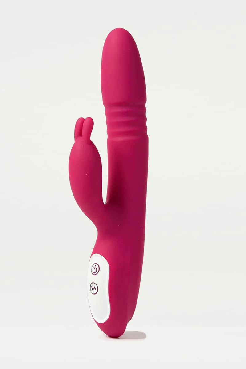 Pink silicone Myvelvettouch Rabbit Clitoral Stimulator and Thrusting Vibrator with a white button on a light gray background Main image