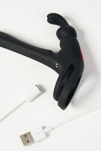 Black Myvelvettouch Rabbit Couple Vibrating Cock Ring with a USB cable on a white background