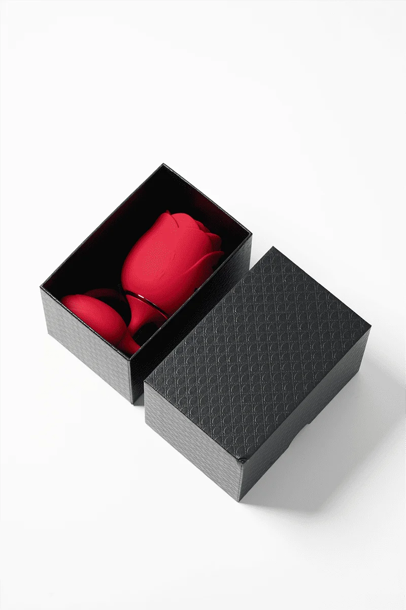 Myvelvettouch Rose 3-in-1 Sucking and Beating Egg Vibrator in a black gift box on a white background