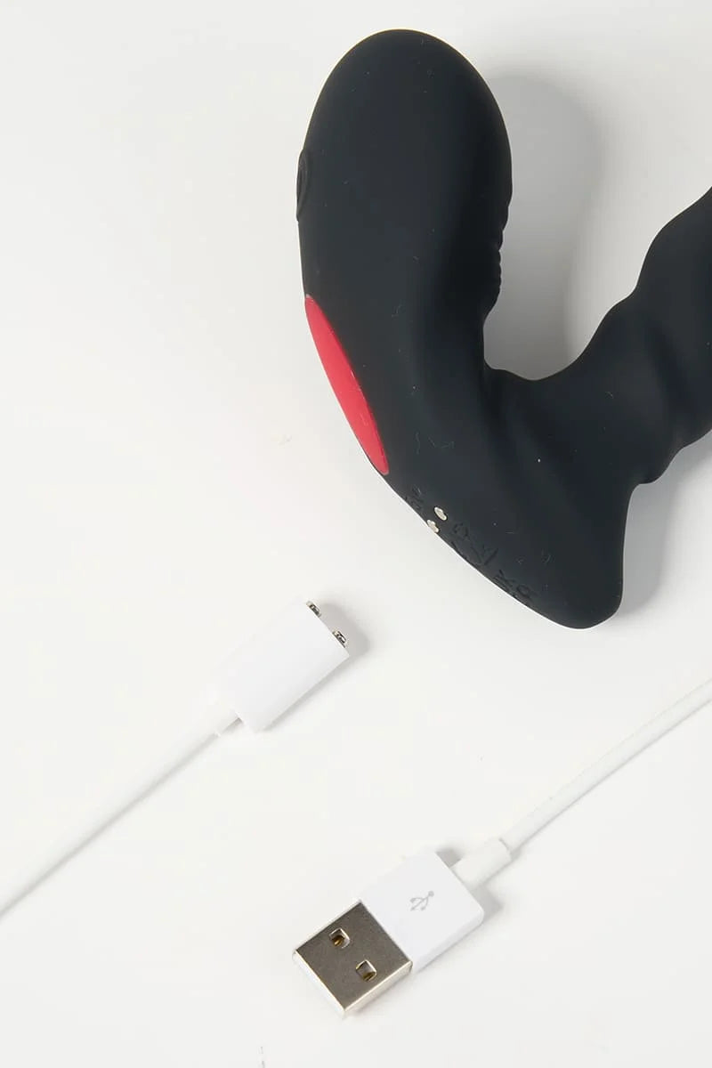 Black and red Myvelvettouch Unisex Prostate Vibrator with a USB cable on a white background