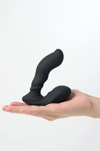 Black silicone Myvelvettouch Unisex Prostate Vibrator held in a hand against a white background