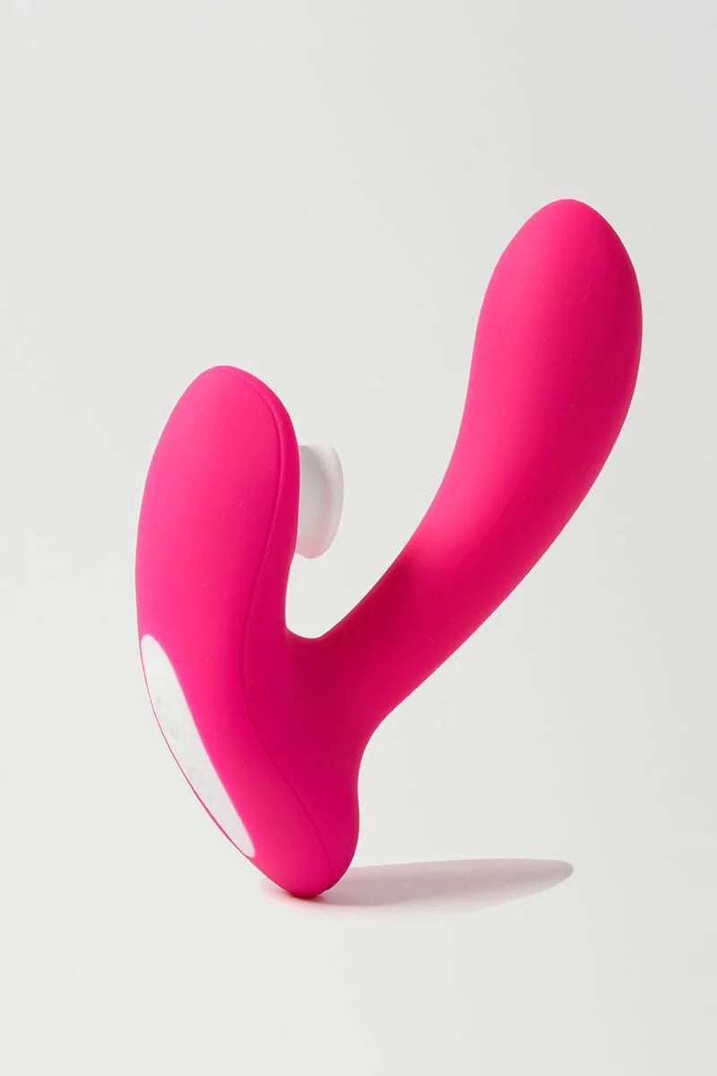 Pink and white Myvelvettouch Wearable Clitoral Sucking Vibrator with Vibration and Remote Control on a light gray background Main image