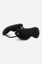Black eye mask on a white background