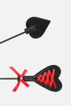 Long Handle Feather Tickler Paddle, Black heart-shaped beats with red designs on a white background