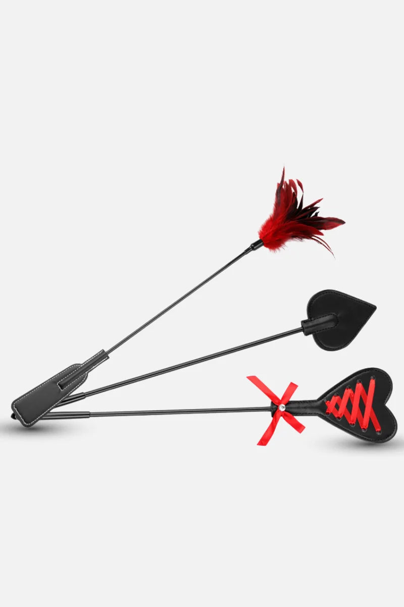 Long Handle Feather Tickler Paddle, Two arrows with red fletchings beats on a white background Main image
