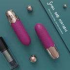 Myvelvettouch wine rose and golden bullet vibrator on a teal background with text about portability.