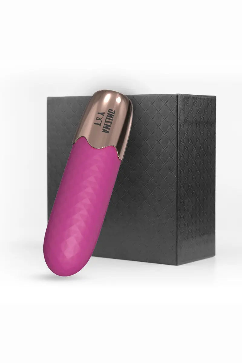 Myvelvettouch wine rose and golden bullet vibrator on a black box with 'myvelvettouch' branding